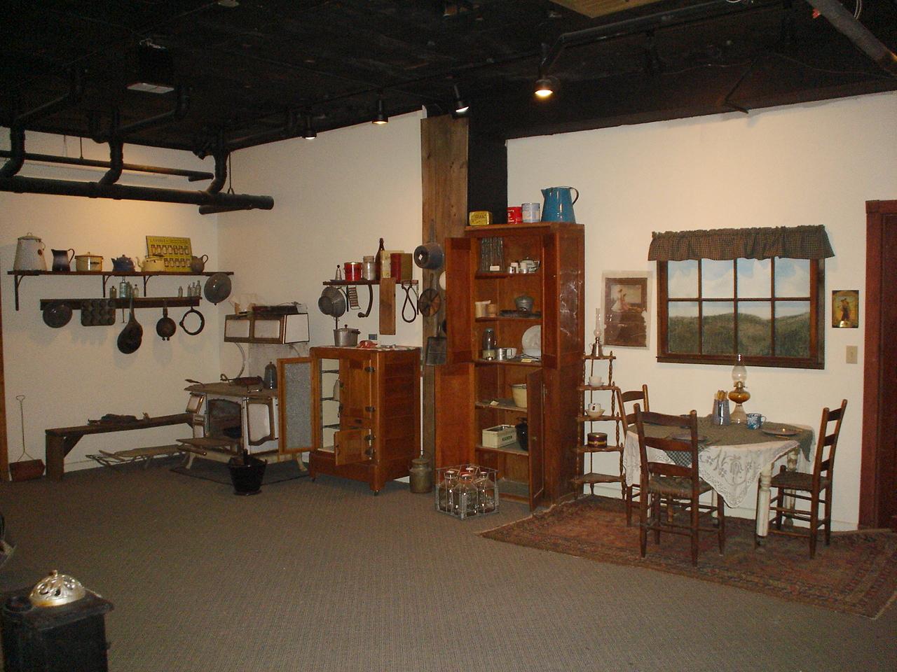 Museum kitchen and household exhibit with period furnishings